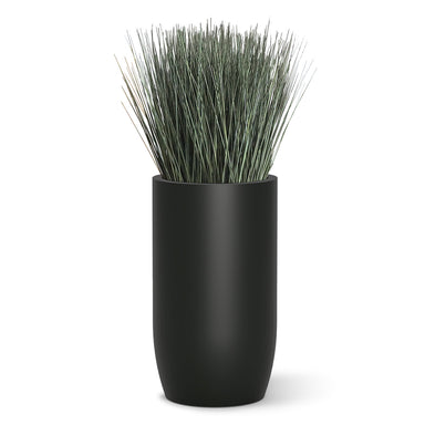 Botanical design with cortada grass in a black fiberglass barrel.