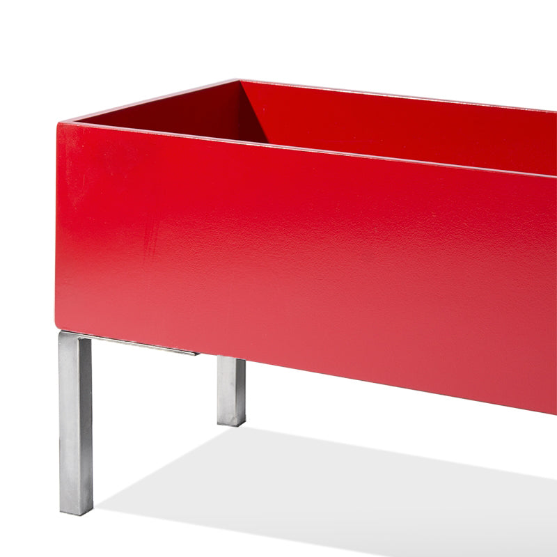 50-inch rectangular indoor planter with a glossy red finish and modern brushed stainless steel legs.