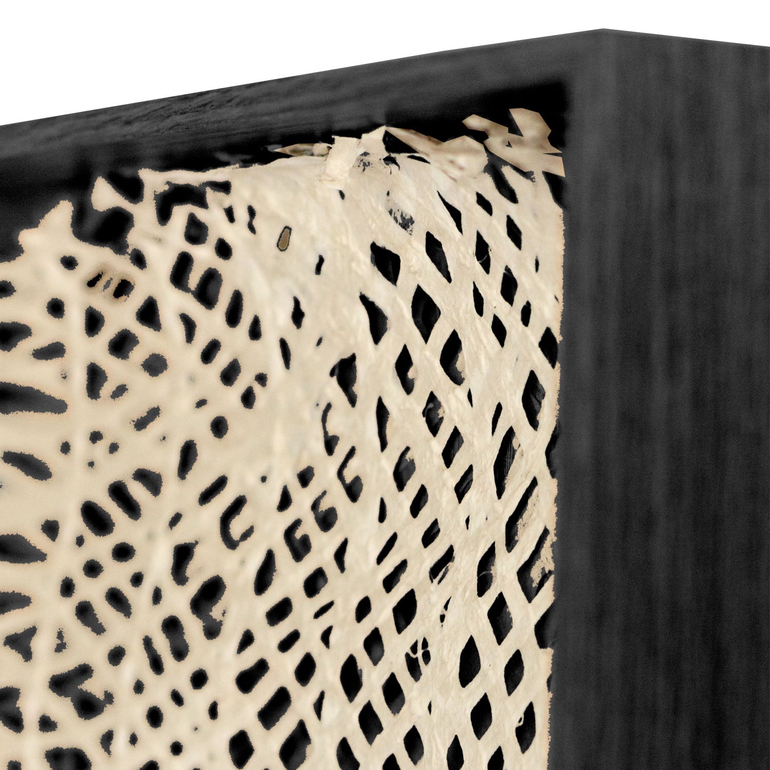 Close-up of a framed piece of art paper with a lattice pattern.