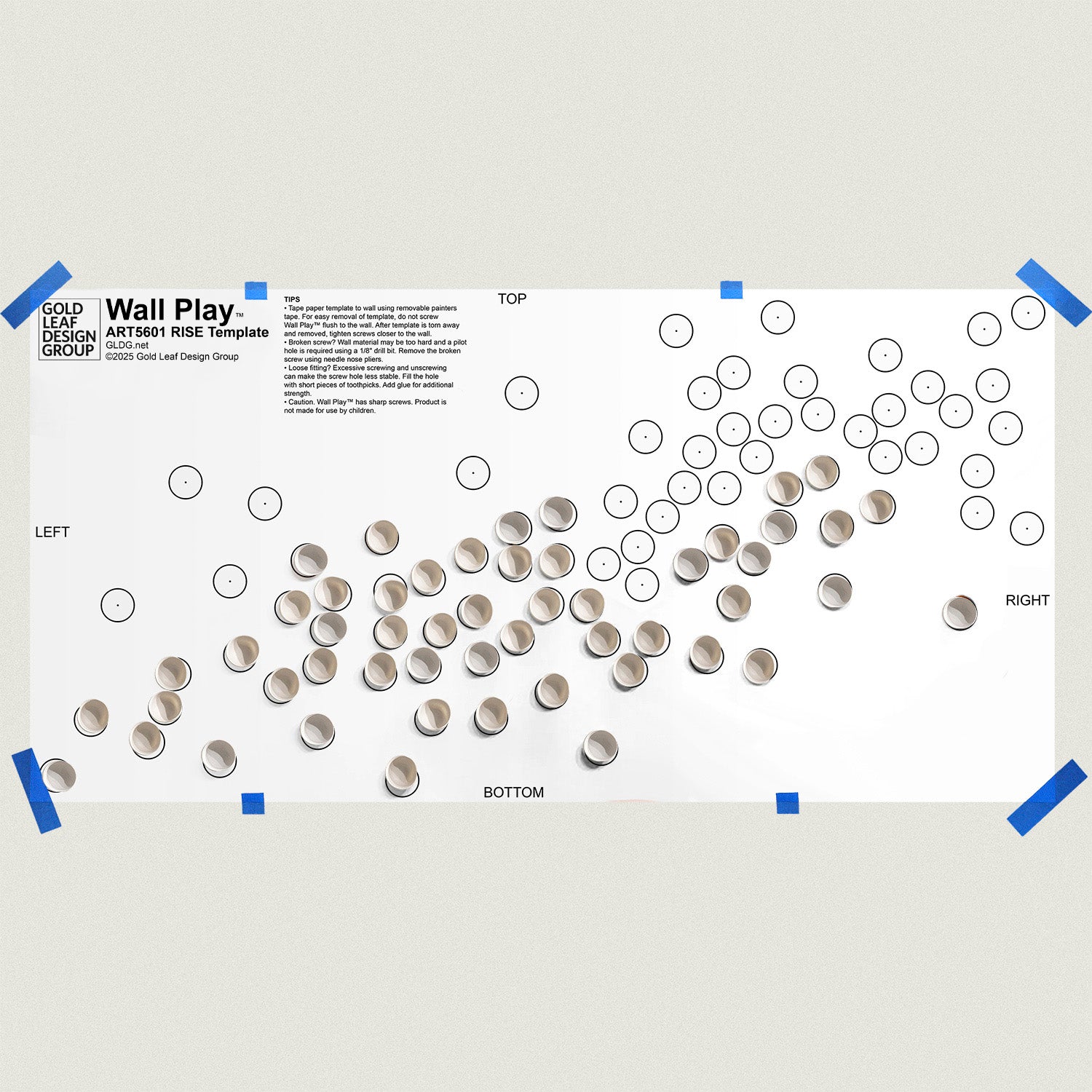 Template for wall art installation with White Seed Wall Play on a tan background.