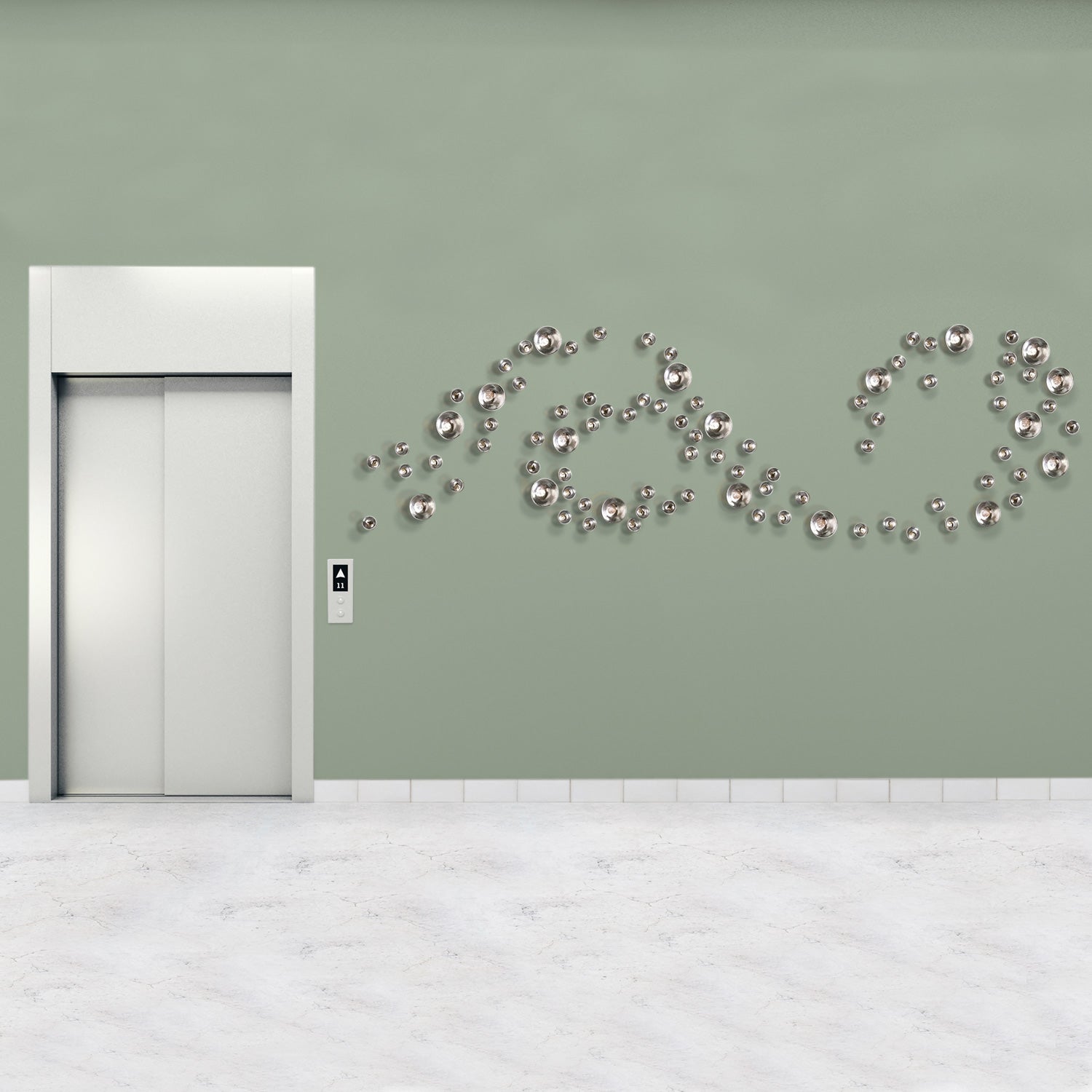 Elevator with decorative Wall Play wall art on a light green wall