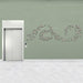 Elevator with decorative Wall Play wall art on a light green wall