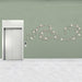 Elevator with decorative Wall Play wall art on a light green wall