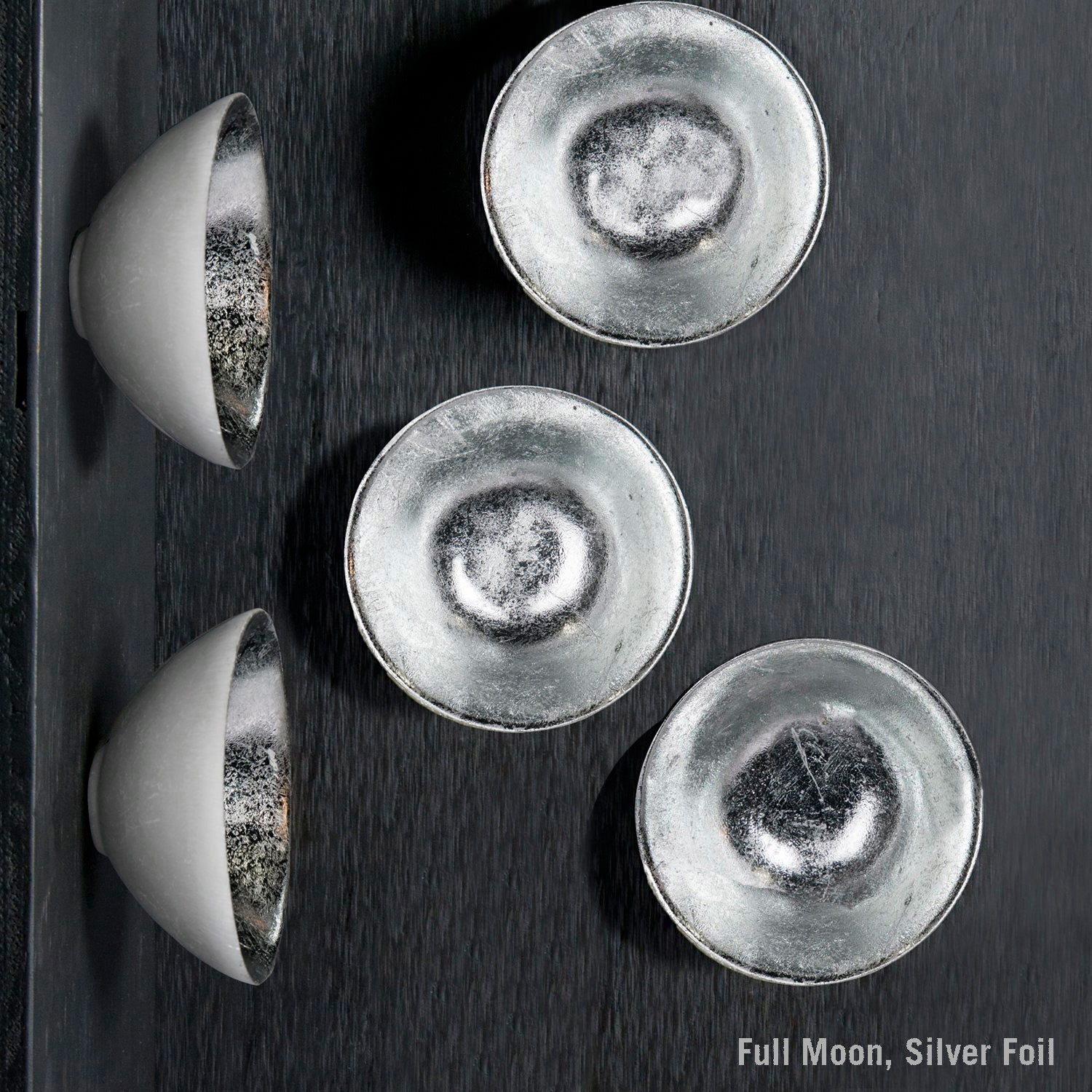 Silver foil moon-shaped objects on a dark surface with 'Full Moon, Silver Foil' text.