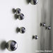 Close-up of silver knobs on a white surface with 'Silver Gloss (Polished)' text.