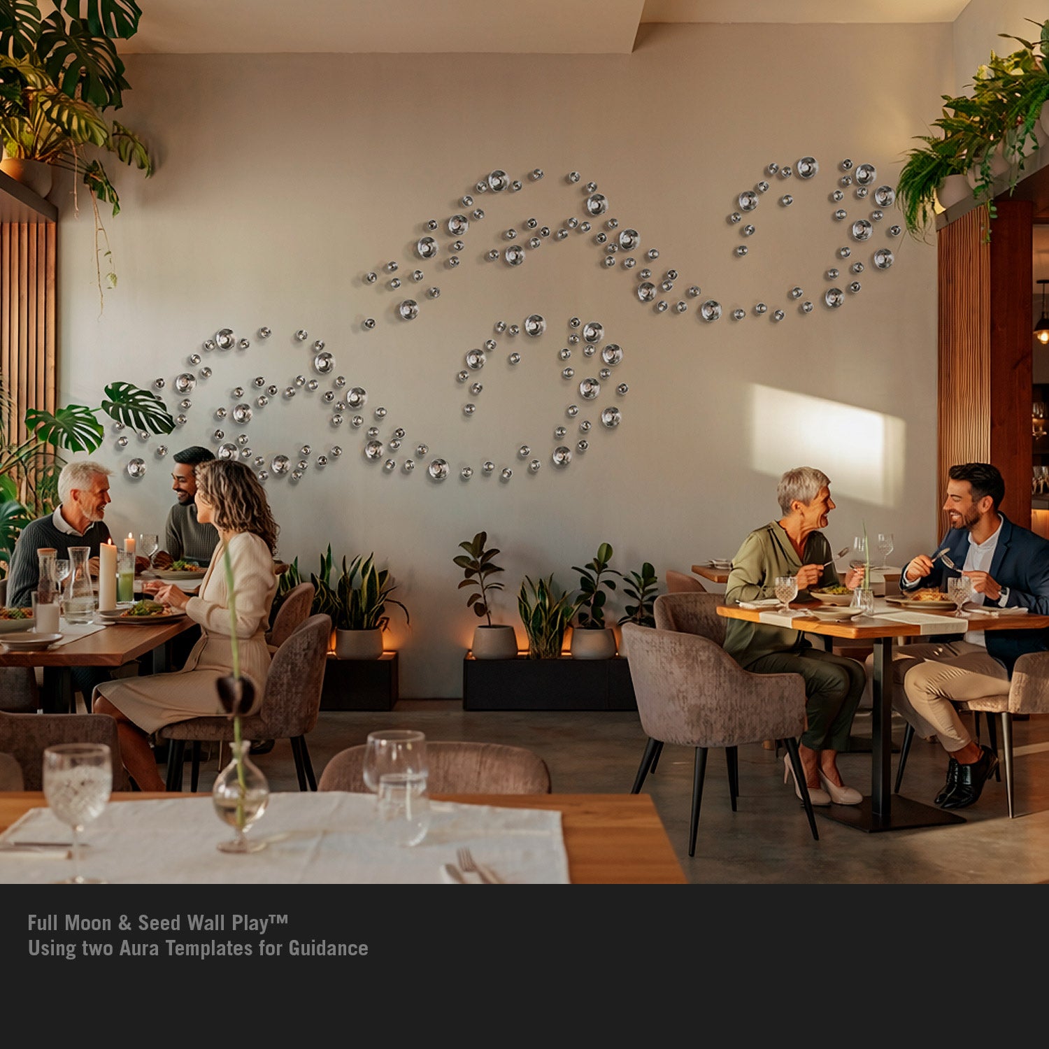 Silver Full Moon and Seed Wall Play in a restaurant environment. People dining in the foreground.