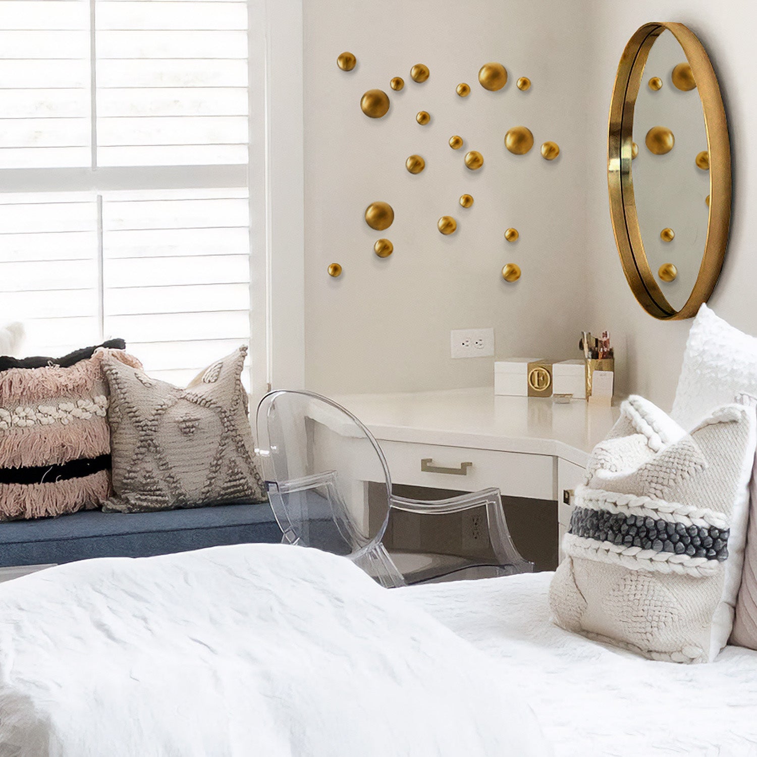 Gold Orb Wall Play on a wall with mirror and desk in a bedroom setting.