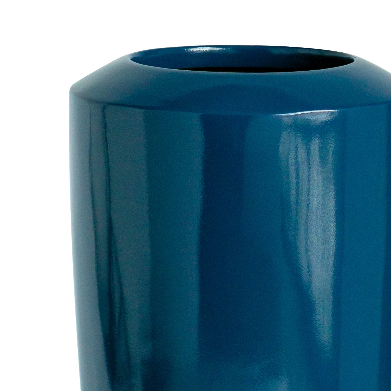 Close up of small fiberglass barrel on white background. Glossy blue finish.