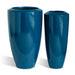 Large and small fiberglass barrel planters on white background. Gloss blue finish.