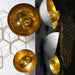 Natsu Gold Wall Art by Gold Leaf Design Group in Atlanta Showroom front and side view.